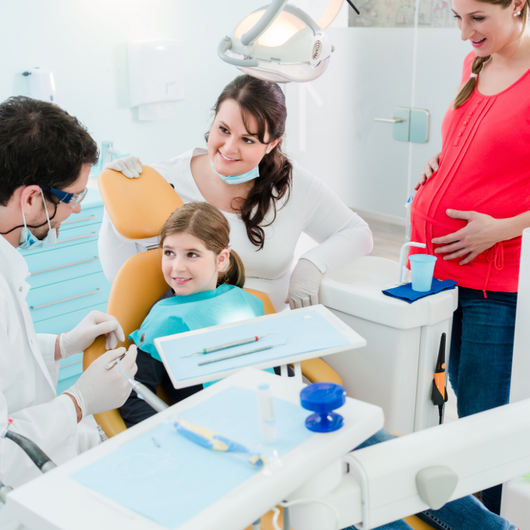 Family returning to dentist Family returning to dentist